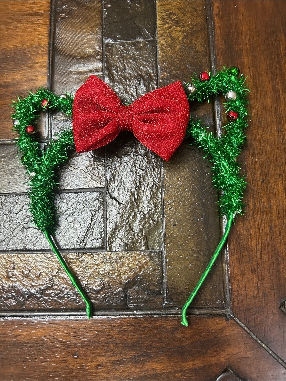 Festive Green Tinsel Headband with Red Bow and small jingle bells